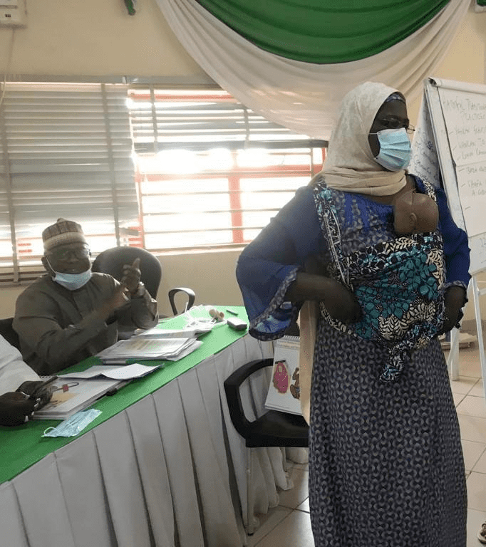 A participant demonstrating kangaroo mother care method during 2-week STOT in Katsina State commenced 18th October 2021